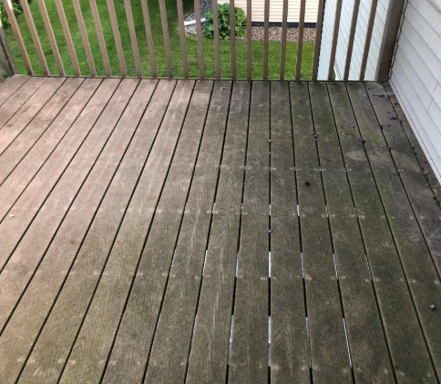 Image of a deck before softwashing