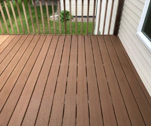 Image of a residential deck after Softwash Platoon's wood deck cleaning services