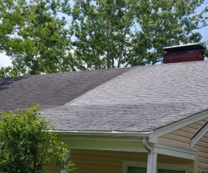 Image of a residential roof after Softwash Platoon's roof cleaning services