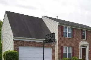 Image of a residential roof after SoftWash Platoon's soft washing services