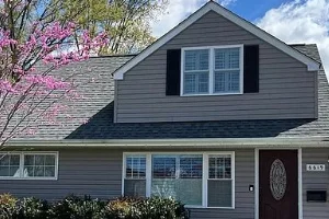 Image of a residential roof after SoftWash Platoon's soft washing services