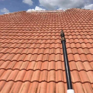 Image of a residential roof after SoftWash Platoon's softwashing services