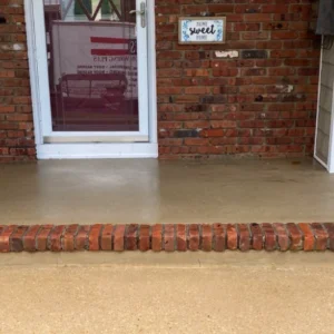 Residential concrete patio after soft washing services from Softwash Platoon