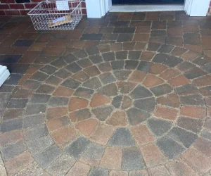 A newly restored residential patio made out of pavers